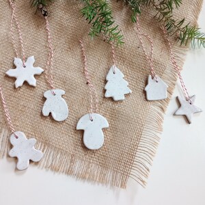 christmas ornaments, gingerbread man, snowflake, mitten, mushroom, tree, house, star