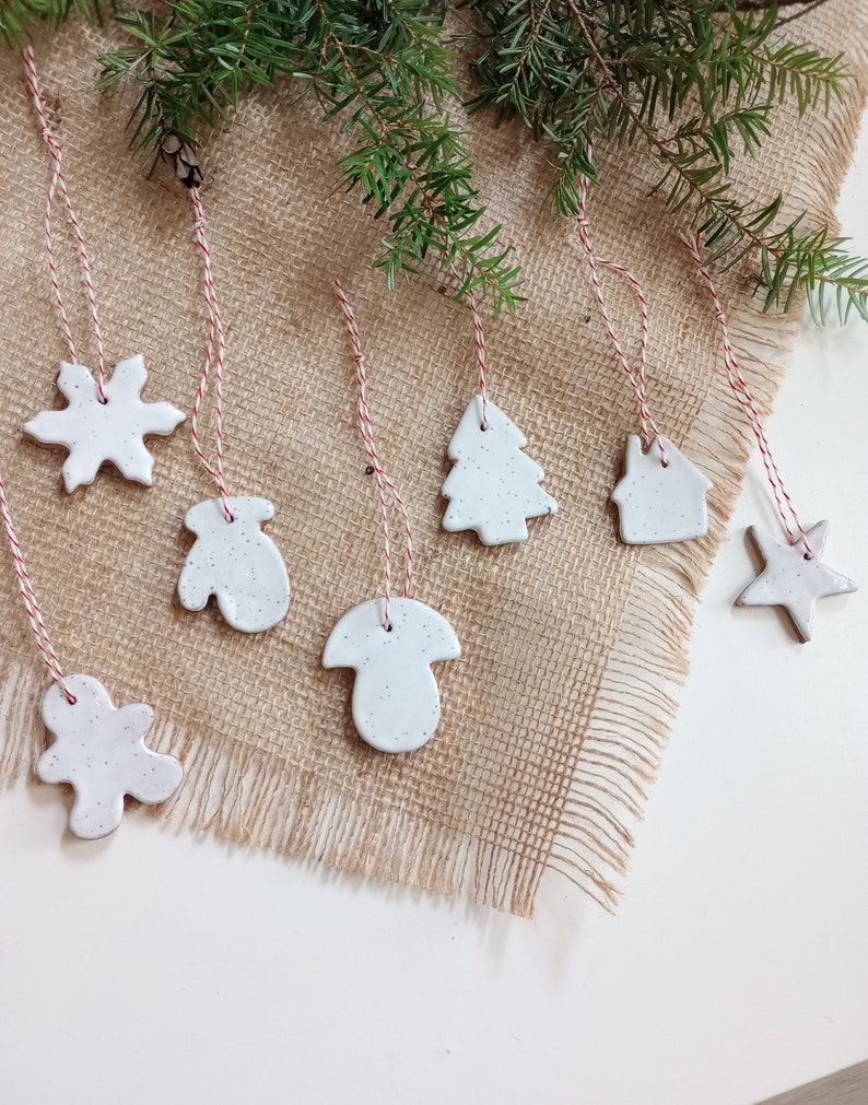 christmas ornaments, gingerbread man, snowflake, mitten, mushroom, tree, house, star