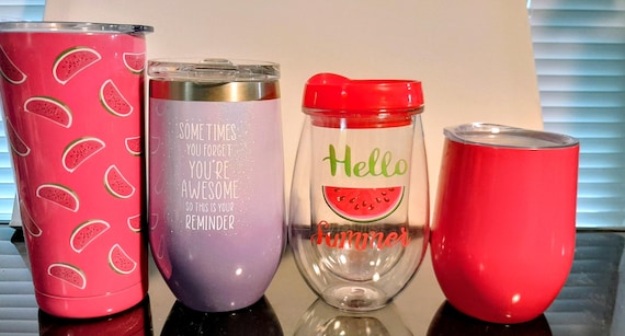 Four Stainless Steel and Plastic Tumblers with Lids