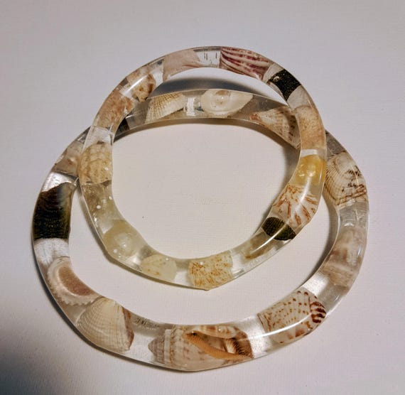 Two Clear Acrylic Bracelets with Seashells