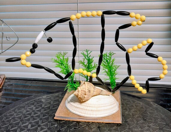 Seashell acrylic base with a wire beaded fish - an original table decoration