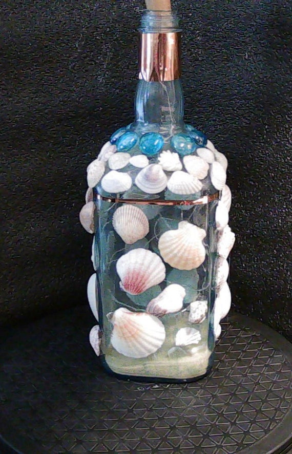 Large Whiskey Bottle with Seashells and Fairy Lights