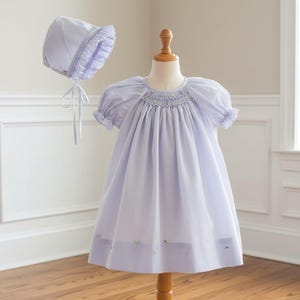 purple smocked infant dress Ocean Baby Girls Exclusive Lilac Lux Collection Satin Smocked Front & Back Petticoat Layered Dress (NB-8Yrs) 65.00 Www.oceanbaby.co.uk