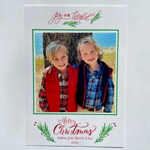 Tarjeta navideña de alegría para el mundo