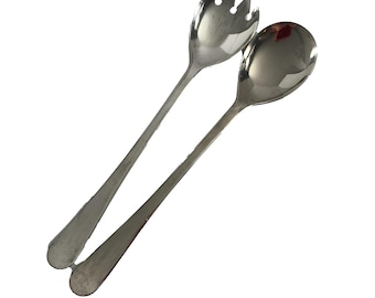 May include: A silver salad serving set with a fork and spoon.