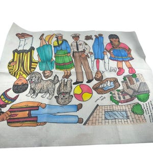May include: A white fabric sheet featuring colorful printed illustrations of various people in diverse outfits, two dogs, a ball, a pet bed, and a house structure. The print includes small text near the house and a circular stamp with the date 9/93.