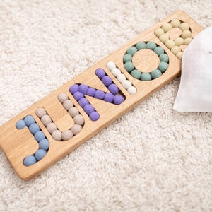 Wooden name board with felt balls Personalized gift for kids custom newborn gift kidsroom decor gift Montessori playroom decor