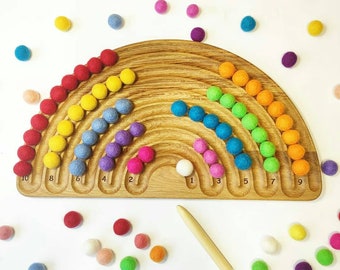 Rainbow tracing board with felt balls