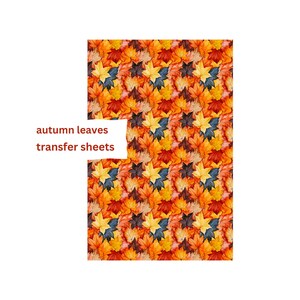 May include: A seamless pattern of autumn leaves in shades of orange, yellow, red, and brown. The leaves are arranged in a repeating pattern, creating a festive and colourful design.