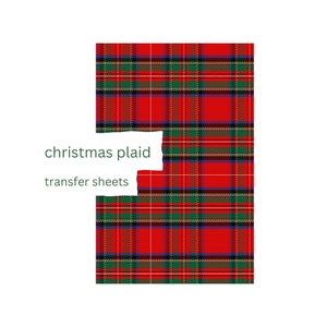 Peut inclure: Feuilles de transfert à motif écossais rouge, vert et blanc pour projets de bricolage. Les feuilles sont étiquetées "christmas plaid transfer sheets".