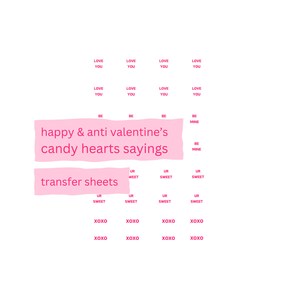 May include: Pink transfer sheets with the text "transfer sheets" and "happy & anti valentine's candy hearts sayings". The sheets have various phrases printed on them, including "love you", "be mine", "ur sweet", and "xoxo".