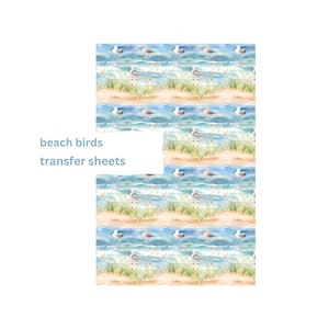 Puede incluir: Hojas de transferencia con un patrón repetitivo de gaviotas volando sobre olas azules y playas de arena. El texto "beach birds transfer sheets" es visible en la parte inferior izquierda de la imagen.