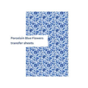 May include: Blue and white floral transfer sheets. The sheets feature a porcelain blue flower pattern. The text "Porcelain Blue Flowers transfer sheets" is printed on the left side of the image.