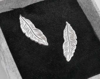 Silver feather stud earrings, bird's feather