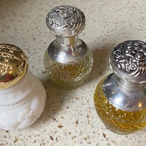 Ornate Perfume Bottles. Avon Ornate Silver/Gold Bottles w Embossed Lids. Avon Gorgeous Bath/Bed Decor. Gorgeous, Classic. Buy Choice
