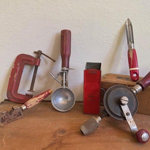 Old Red Kitchen Utensil. Old Red Kitchen Gadgets. Retro Americana Red Wood Decor. Retro Worn Kitchen Utensils. Choice