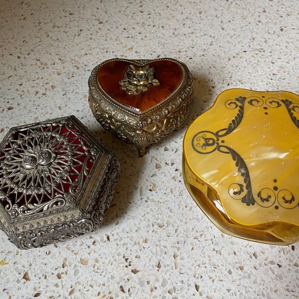 Trinket/Jewelry Box. Ornate Metal Boxes. Music Box. Cut Work Box. Heart Topaz Box. Glass Powder Box. Buy 1, Buy All