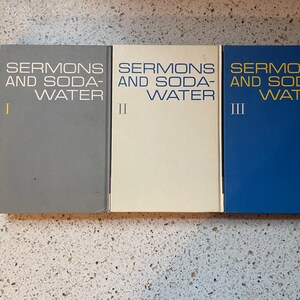 May include: Three gray, white, and blue hardcover books titled "Sermons and Soda-Water" with Roman numerals I, II, and III on the spines.