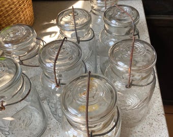 Quart Mason Ideal Jar. Mason Jar Wire Bail Lid. Vintage Worn Bail Lid.  Time Period 1923 - 1933. Sold Per Jar.