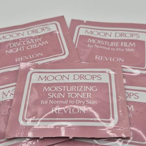 May include: A set of three ceramic mugs with a speckled, matte finish. The mugs are in shades of cream, light gray, and dark gray. Each mug has a simple, minimalist design, perfect for coffee or tea.