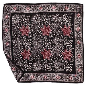 May include: Black square scarf with a floral pattern. The scarf features a repeating design of white leaves and red flowers on a black background. The border has a geometric pattern with red accents.