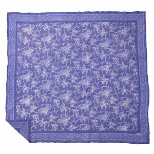 May include: A square purple scarf featuring a repeating white line-art pattern of butterflies and floral branches. The scarf has a decorative border with a geometric design and a small rectangular tag in the bottom right corner.