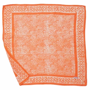 May include: An orange and white patterned square scarf. The scarf features a repeating circular design in white against an orange background. A white border with a geometric pattern frames the scarf. The scarf is made of a lightweight fabric.