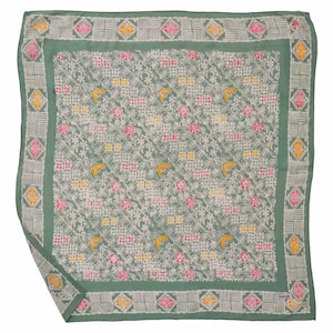 May include: Square green scarf with a floral and geometric pattern. The scarf features a border with repeating geometric shapes in white, pink, and yellow. The center design includes flowers and birds in pink and yellow, set against a white background.