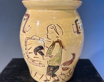 Redware sgraffito canister with chair maker