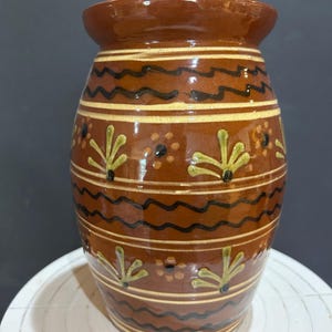 Redware sliptrailed canister