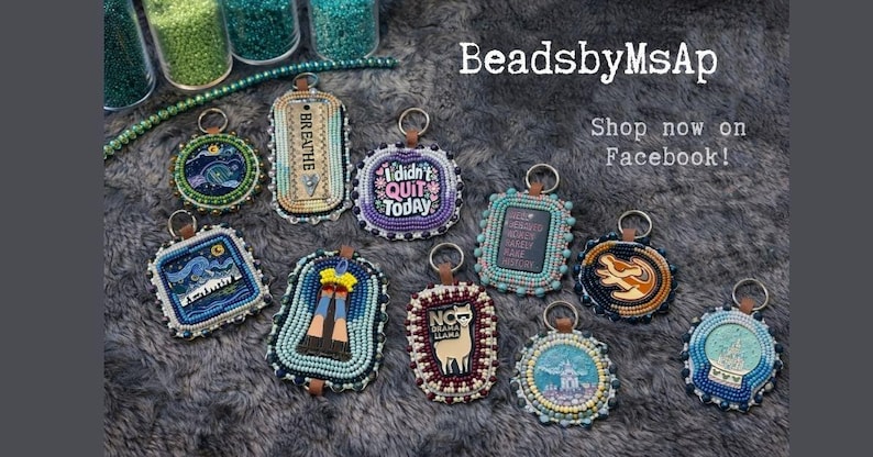 May include: A collection of beaded keychains with various designs and text, including "Breathe" and "I didn't quit today." The keychains are in different shapes and colors, with a leather loop for attachment. The image also includes the text "BeadsbyMsAp" and "Shop now on Facebook!"
