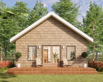 May include: A small, wooden cabin with a brown exterior and a white trim. The cabin has a front porch with two chairs and a potted plant. The cabin is surrounded by trees and grass.