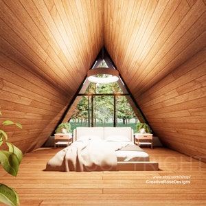May include: A bedroom with a wooden ceiling and a large window overlooking a forest. The bed has a white comforter and a white headboard. There are two nightstands with lamps on either side of the bed.