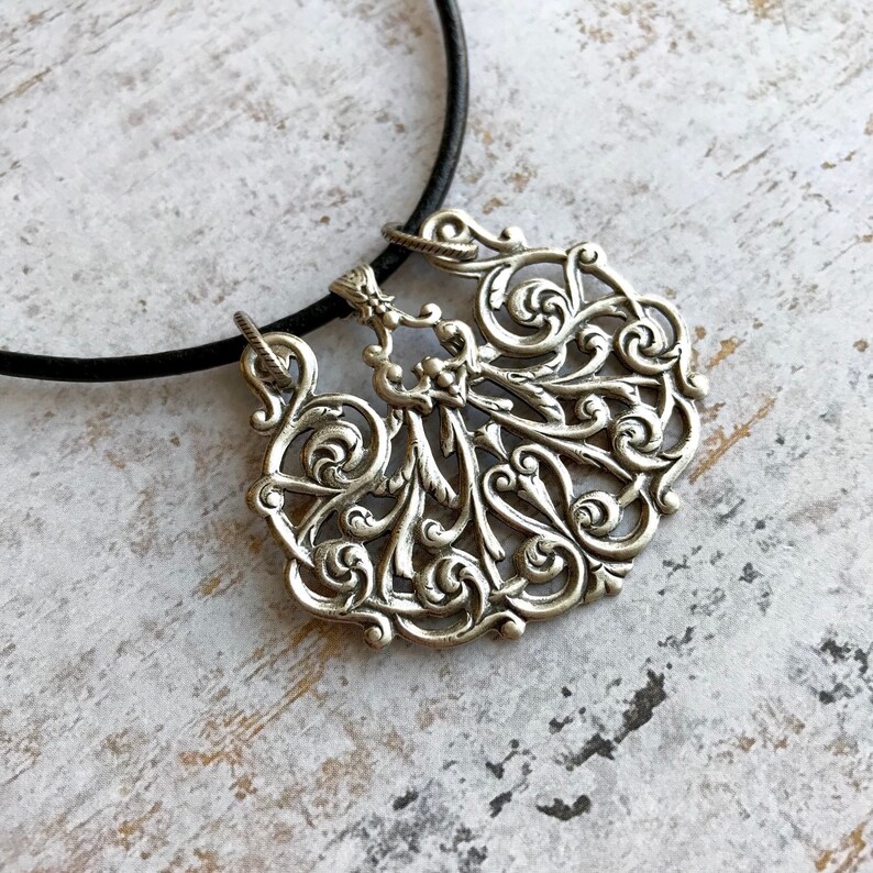 Oxidized sterling silver plated brass filigree pendant on 14 genuine leather choker with extra 2 extender chain