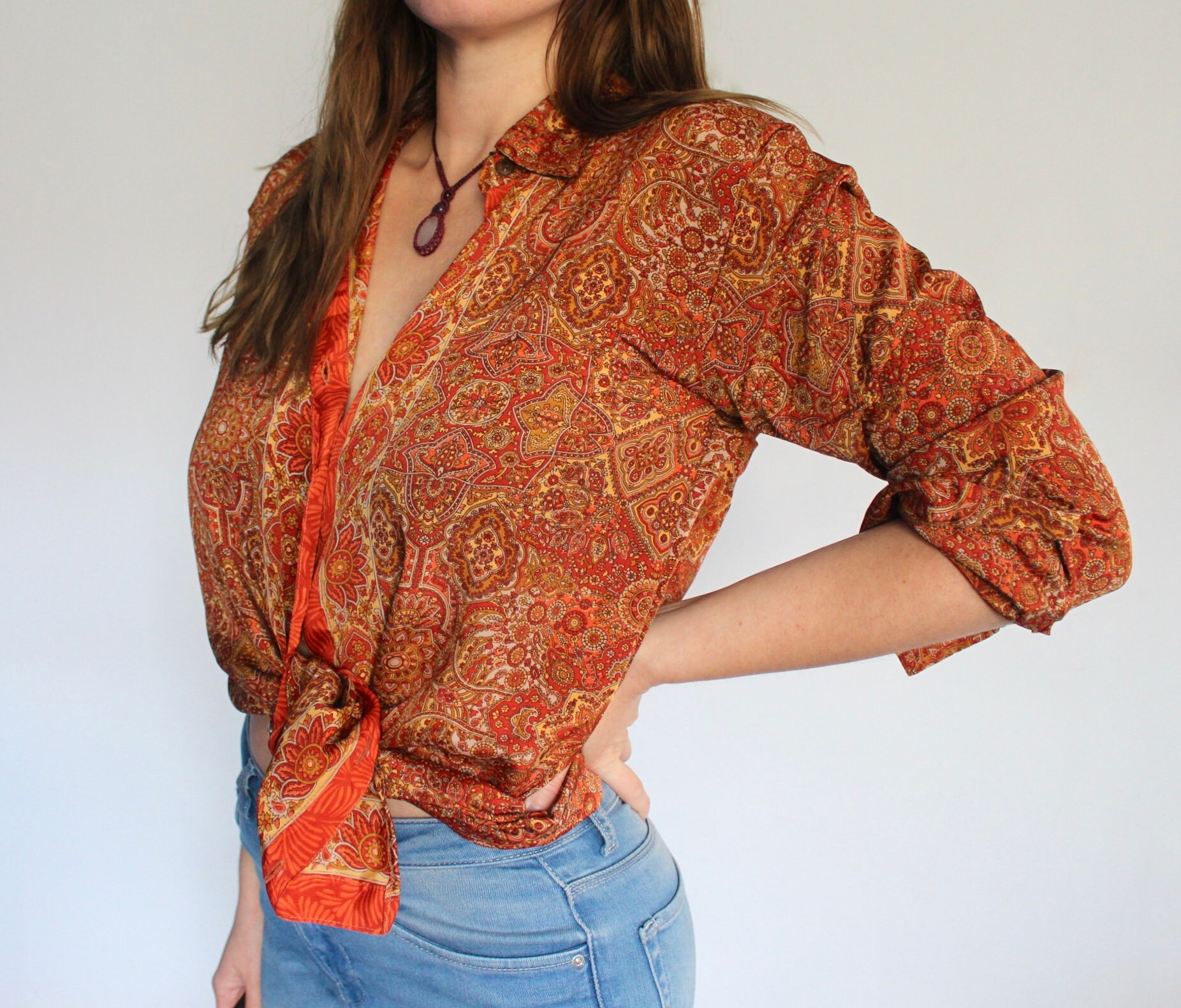 burnt orange silk blouse
