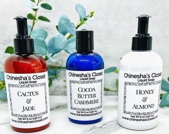 May include: Three 8-ounce bottles of liquid soap with different scents. The bottles are labeled "Chinesha's Closet" and feature the following scents: "Cactus & Jade", "Cocoa Butter Cashmere", and "Honey & Almond".