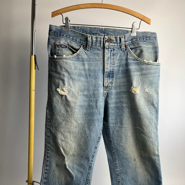 Vintage Lee 90's Straight Jean Men Style  2008944 Size 36 x 30, Thrashed, Stained, Faded, Ripped, and perfect. Made in USA. Made in Alabama