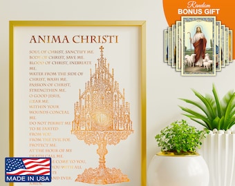 May include: A gold-colored print with the text "Anima Christi" and a prayer in English. The print features a stylized image of a chalice with a host. The print is framed in a gold frame and has a "Made in USA" label at the bottom.
