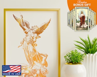 May include: A gold-toned print of an angel defeating a demon. The angel is depicted with wings and a spear, while the demon is lying beneath the angel's feet. The print is framed in a gold frame and is hanging on a white wall.