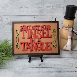 Zorg dat je klatergoud niet in een wirwar komt. SVG Kerstverlichting Gelaagde ingelijste borden Holiday Home Decor