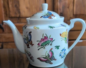 Vintage White Porcelain Teapot with Colorful Butterfly and Floral Motif 6"