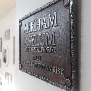 arkham wall plaque