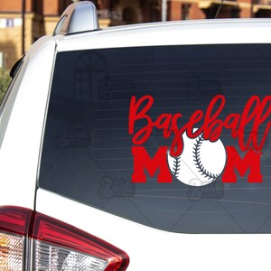 May include: Red vinyl decal with the words "Baseball Mom" and a white baseball. The decal is on the back window of a white car. #2