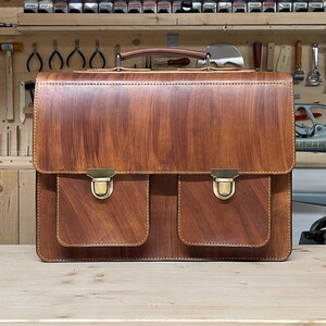 Exclusive business briefcase in hand colored best veg tan Italian leather, fully customizable in color and seam image 1
