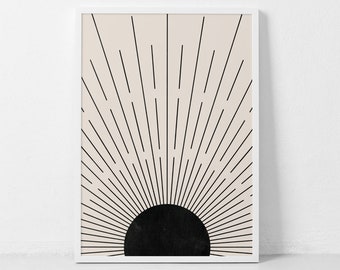 May include: A black and white minimalist art print featuring a stylized sun with radiating lines on a beige background.