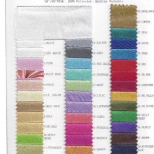 May include: A color chart of Charmeuse Satin fabric, 58/60 inches wide, 100% polyester, machine washable. The chart displays a range of colors, including white, pink, gold, and various shades of blue, green, and red.