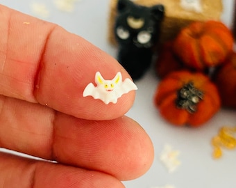 12 pcs micro tiny white bats.  Mini Kawaii cartoon flat back resin bats.