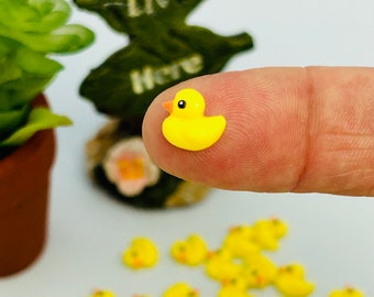 12 pcs tiny yellow ducks.  8x8 mm mini Kawaii Cartoon resin duck. Cabochon DIY flat back