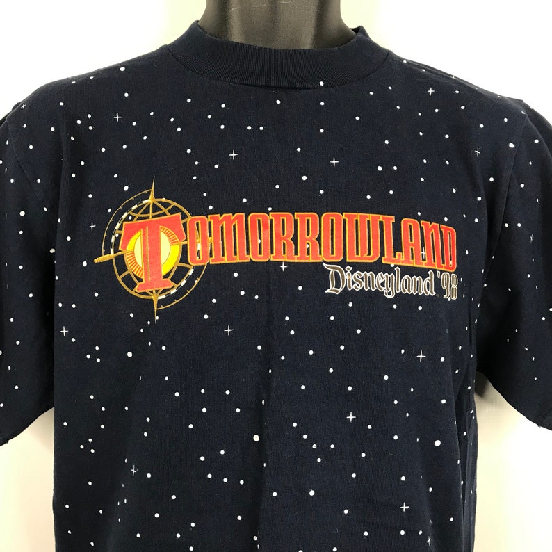 Vintage 90s Mickey Inc Blue Tomorrowland 1998 All Over Print T-shirt Size M