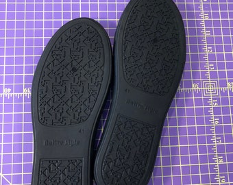 Black rubber cupsoles, shoe soles, sneaker soles